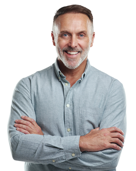 Man smiling with arms crossed